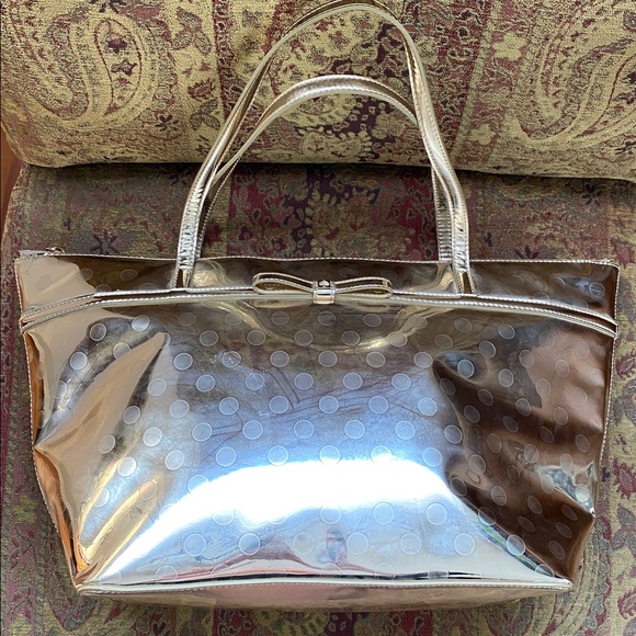 kate spade Handbags - Kate Spade gold bag NWT Sized for day wear or carry on